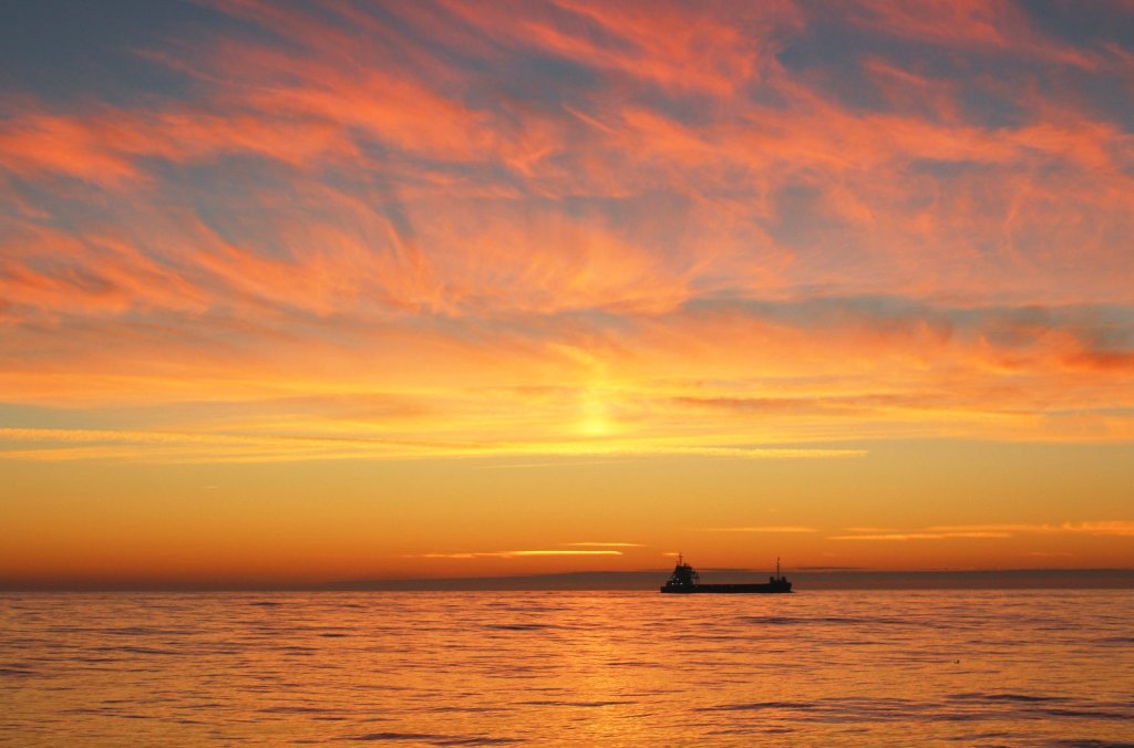 A rather spectacular sunset with Morocco in the background.