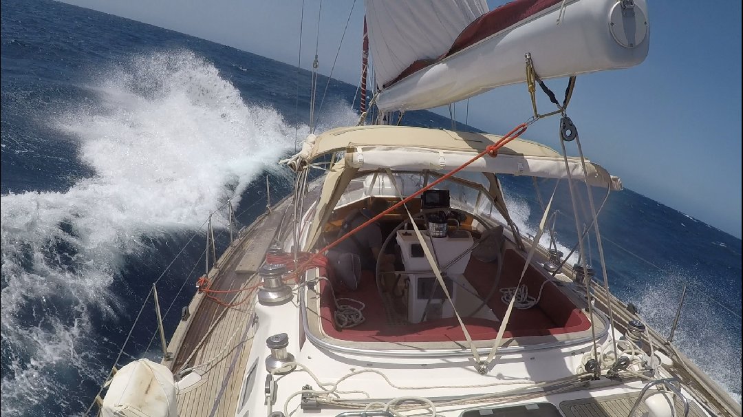 Sailing boat in bigger waves